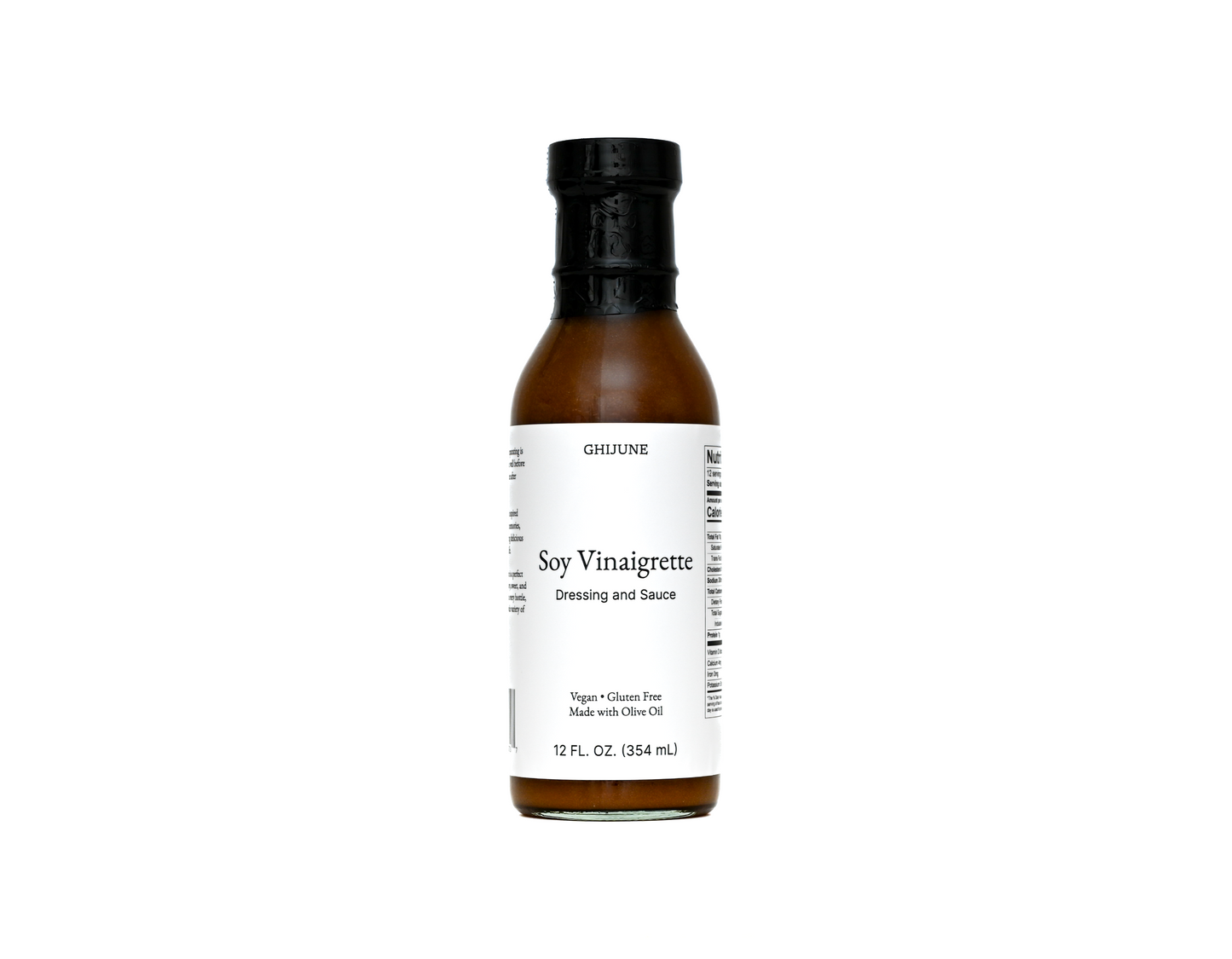 Bottle of soy vinaigrette dressing on a white background