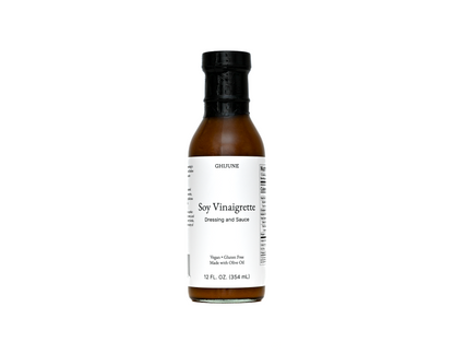 Bottle of soy vinaigrette dressing on a white background