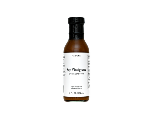 Bottle of soy vinaigrette dressing on a white background